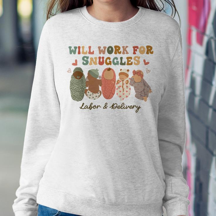 Groovy Will Work For Snuggles Labor & Delivery Nurse Women Crewneck Graphic Sweatshirt Funny Gifts