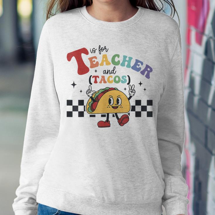 T Is For Teacher And Tacos Funny Back To School Teaching Women Crewneck Graphic Sweatshirt Personalized Gifts