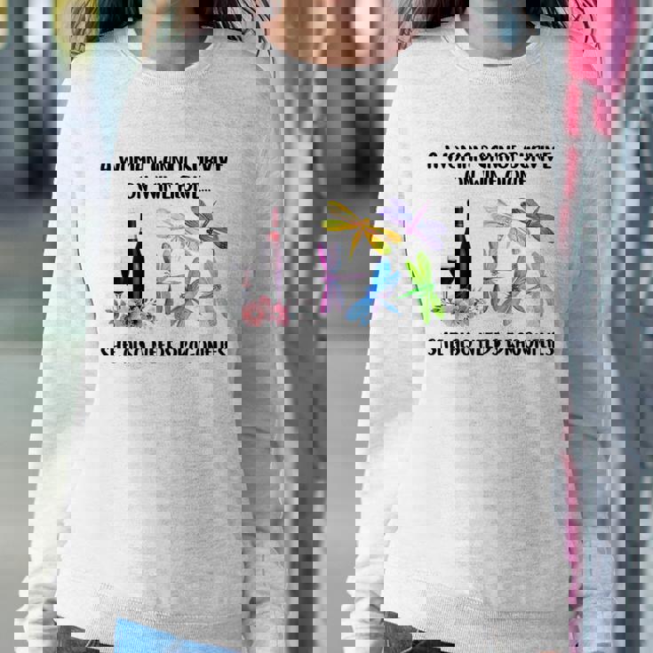 A Woman Cannot Survive On Wine Alone Dragonfly Lovers Women Sweatshirt Personalized Gifts