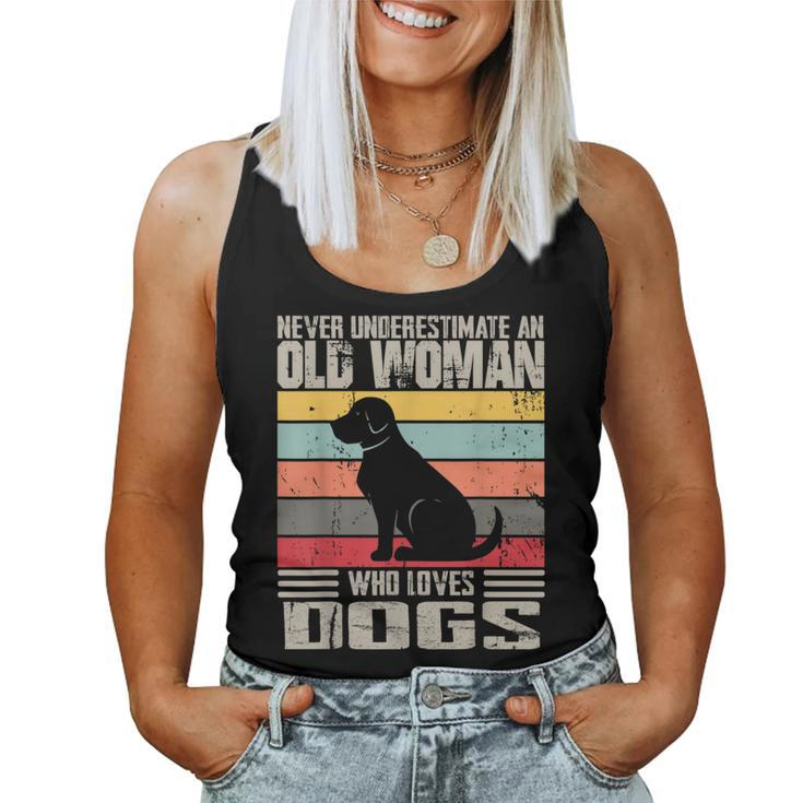 Vintage Never Underestimate An Old Woman Who Loves Dogs Cute Women Tank Top