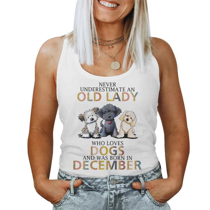 Never Underestimate Old Lady Loves Dogs Born In December Women Tank Top