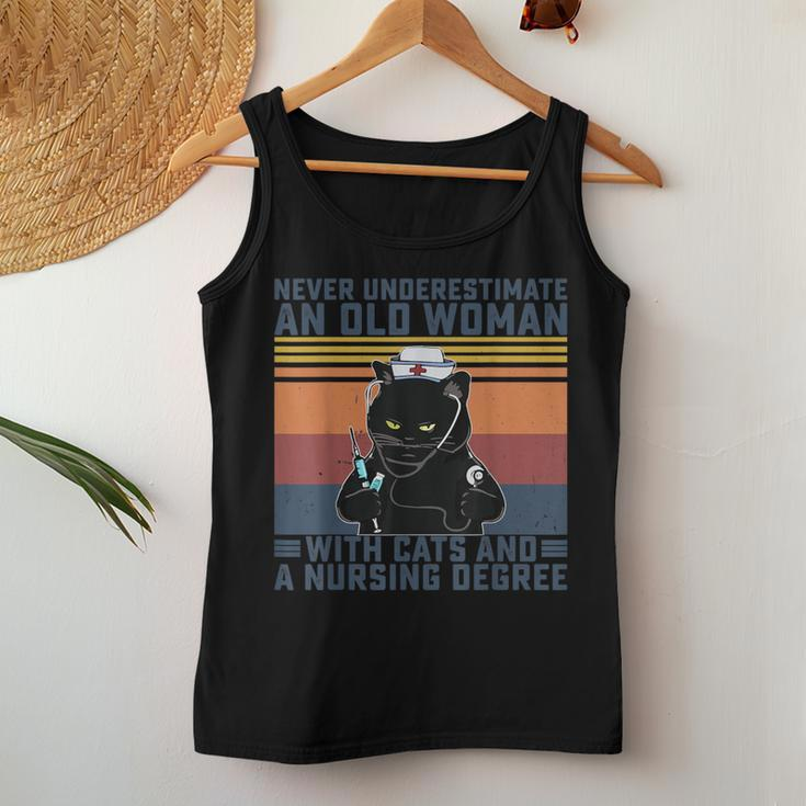 Never Underestimate An Old Woman With Cats & A Nursing Degre Women Tank Top Personalized Gifts