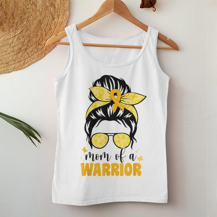 Mom Of A Warrior Childhood Cancer Messy Bun Gold Ribbon Mama Women Tank Top Unique Gifts