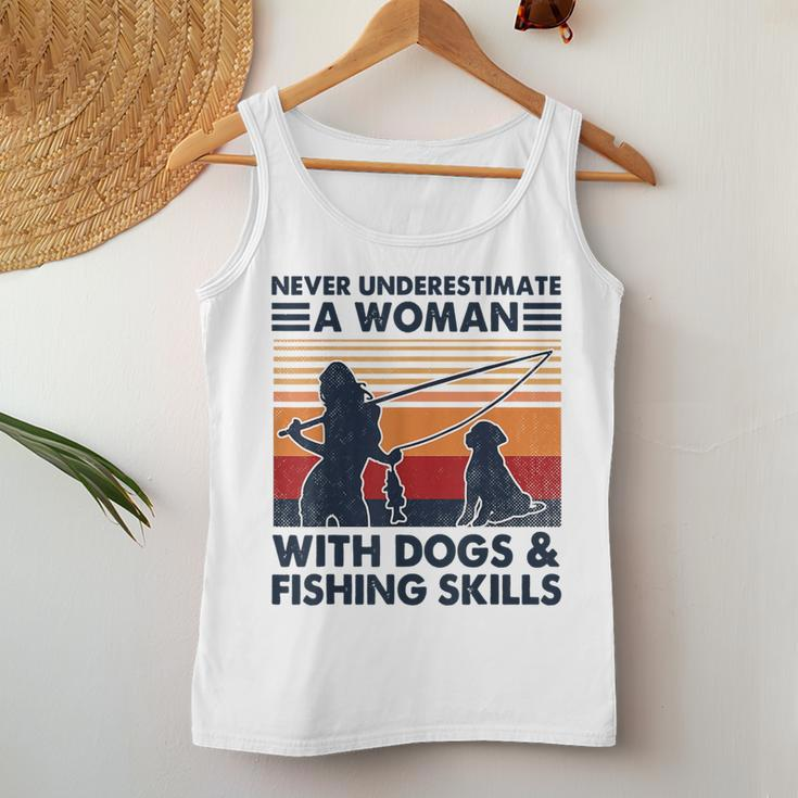 Never Underestimate A Woman With Dogs And Fishing Skills Women Tank Top Unique Gifts