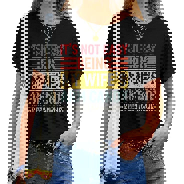 Its Not Easy Being My Wifes Arm Candy Here I Am Nailing It Women T-shirt