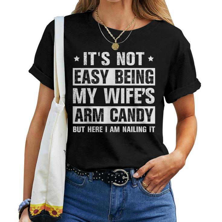 Its Not Easy Being My Wifes Arm Candy Here I Am Nailing It Women T-shirt
