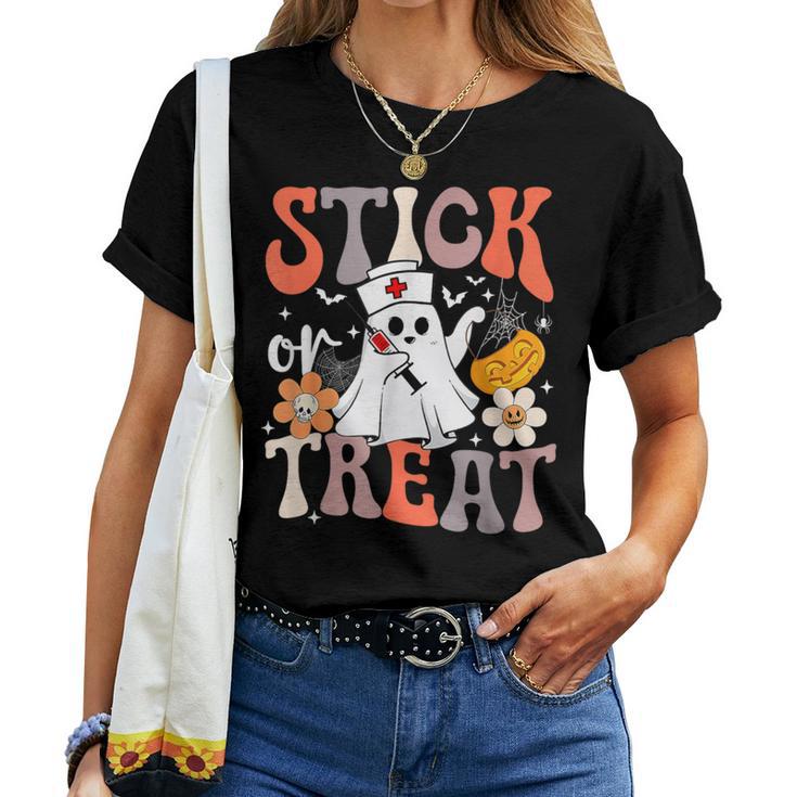 Stick Or Treat Ghost Nurse Halloween Crna Emergency Er Nurse Women T-shirt