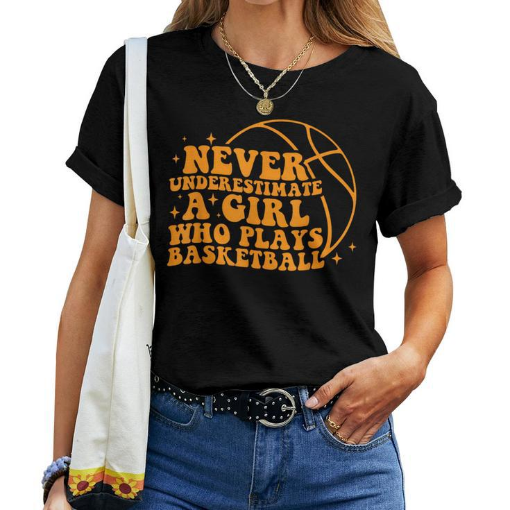 Never Underestimate A Girl Who Plays Basketball Groovy Women T-shirt