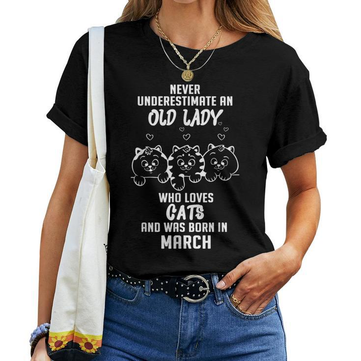 Never Underestimate An Old Lady Who Loves Cats Born In March Women T-shirt