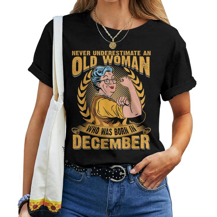 Never Underestimate An Old Woman Who Born In December Women T-shirt