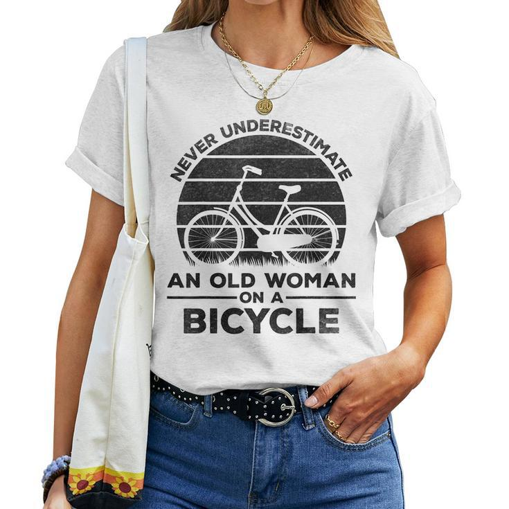 Cyclist Women Never Underestimate An Old Woman On A Bicycle Women T-shirt