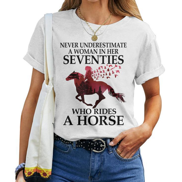 Never Underestimate A Woman In Her Seventies Rides A Horse Women T-shirt