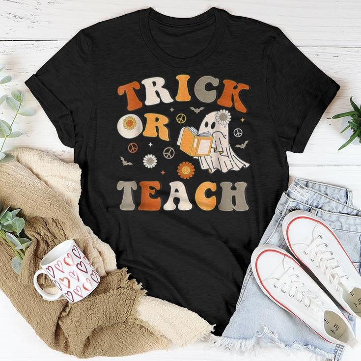 Trick Or Teach Groovy Halloween Retro Floral Ghost Teacher Women T-shirt Unique Gifts