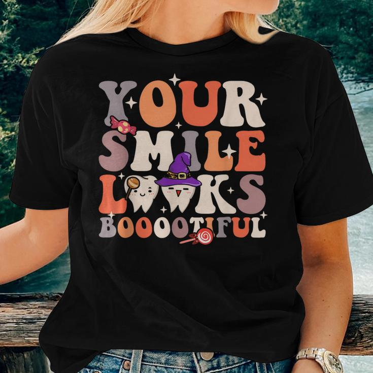 Your Smile Looks Bootiful Dentist Halloween Spooky Groovy Women T-shirt Gifts for Her