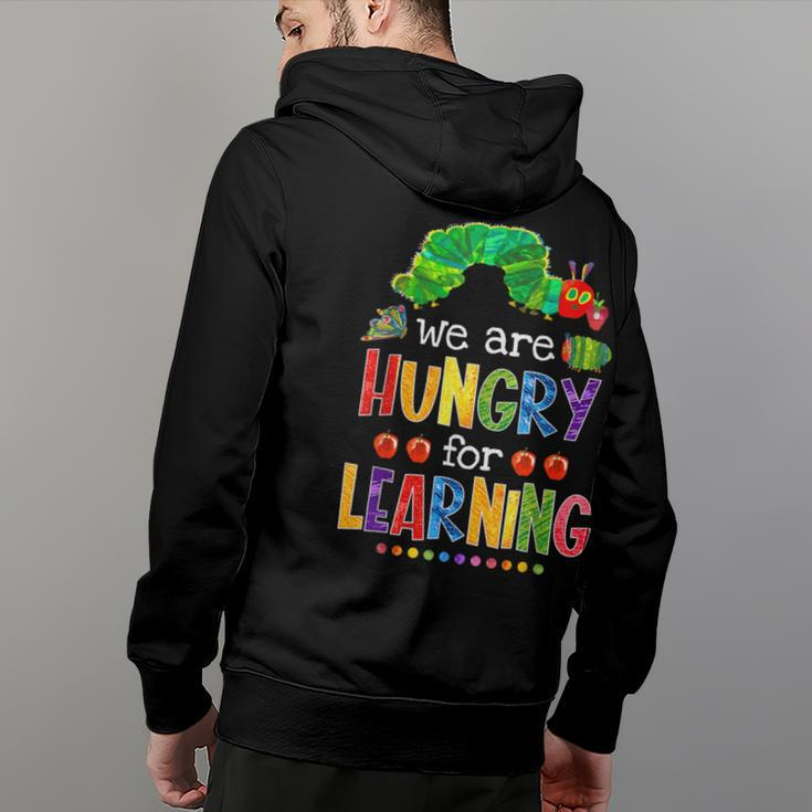 Caterpillar We Are Hungry For Learning Back To School Hoodie Back Print