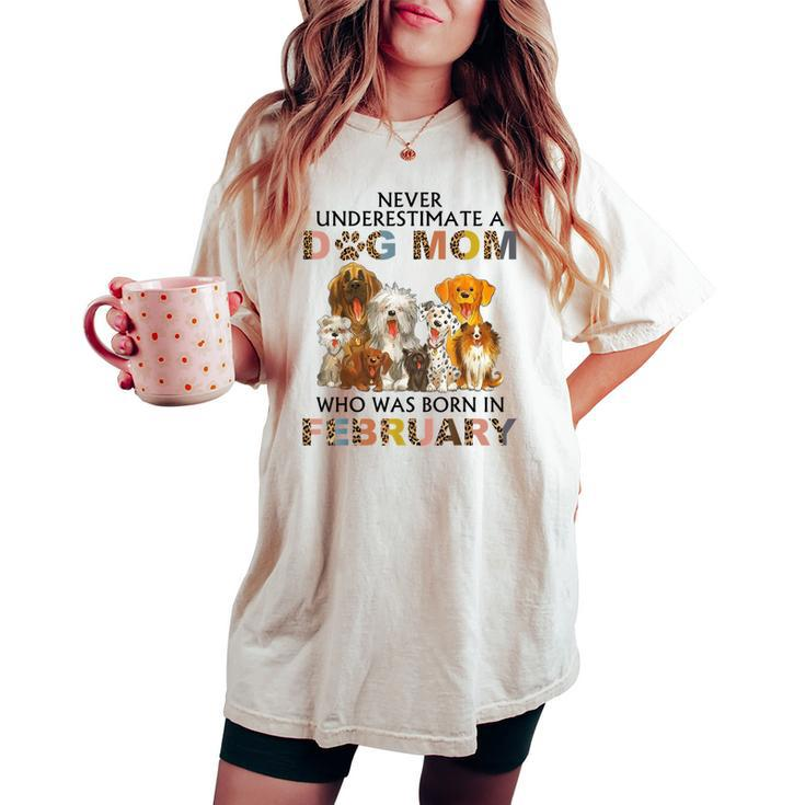 Never Underestimate A Dog Mom Who Was Born In February Women's Oversized Comfort T-shirt