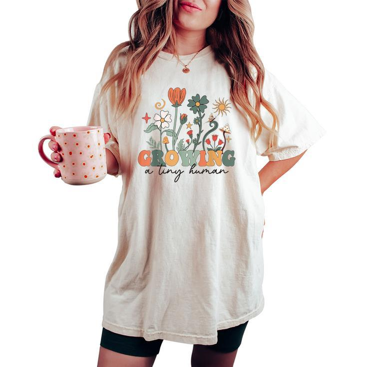 Growing A Tiny Human Floral Flowers Pregnancy Women's Oversized Comfort T-shirt