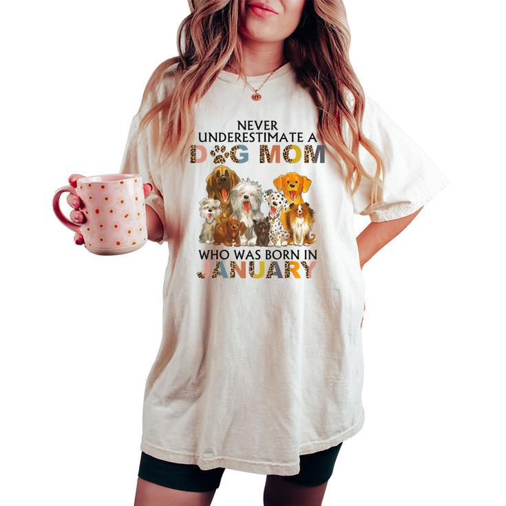Never Underestimate A Dog Mom Who Was Born In January Women's Oversized Comfort T-shirt