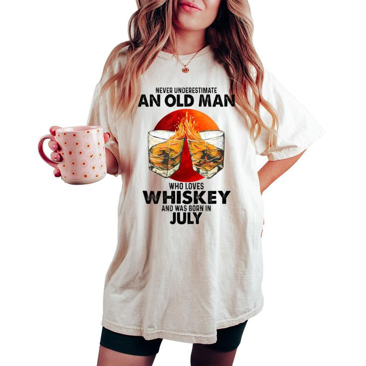 Never Underestimate An Old July Man Who Loves Whiskey Women's Oversized Comfort T-shirt