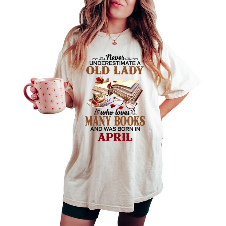 Never Underestimate A Old Lady Who Loves Many Books April Women's Oversized Comfort T-shirt