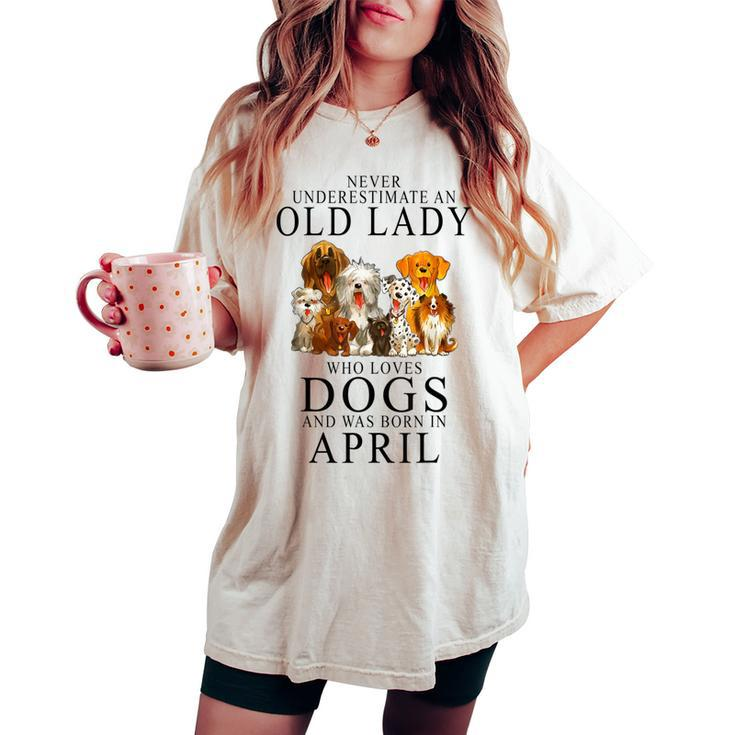 Never Underestimate An Old Lady Who Loves Dogs Women's Oversized Comfort T-shirt