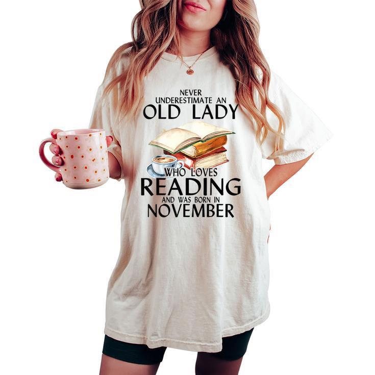 Never Underestimate An Old Lady Who Loves Reading November Women's Oversized Comfort T-shirt