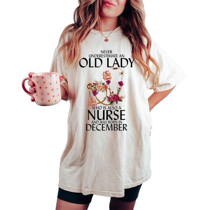 Never Underestimate An Old Lady Who Is Also A Nurse December Women's Oversized Comfort T-shirt