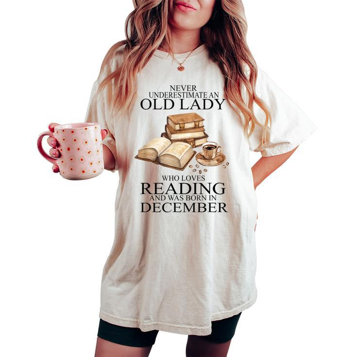 Never Underestimate An Old Lady Reading Born In December Women's Oversized Comfort T-shirt
