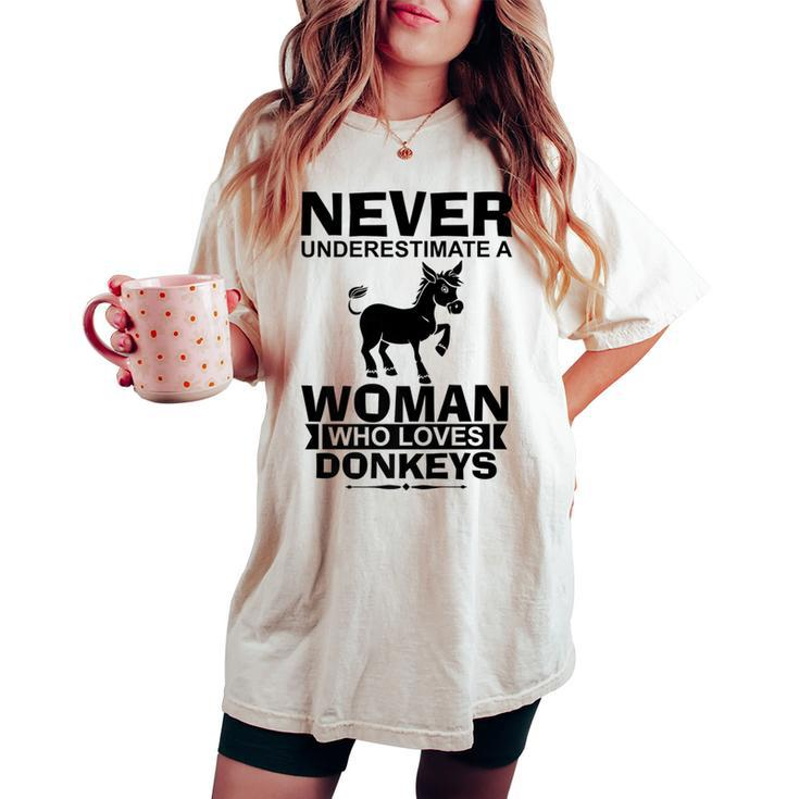 Never Underestimate A Woman Who Loves Donkeys Donkey Women's Oversized Comfort T-shirt