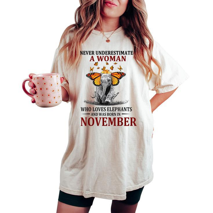 Never Underestimate A Woman Who Loves Elephants November Women's Oversized Comfort T-shirt