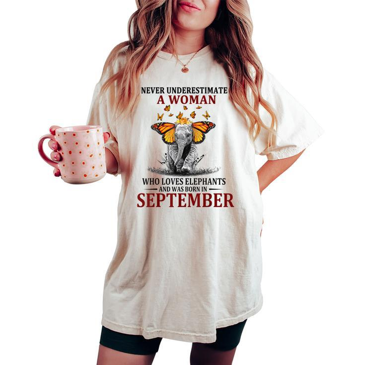 Never Underestimate A Woman Who Loves Elephants September Women's Oversized Comfort T-shirt