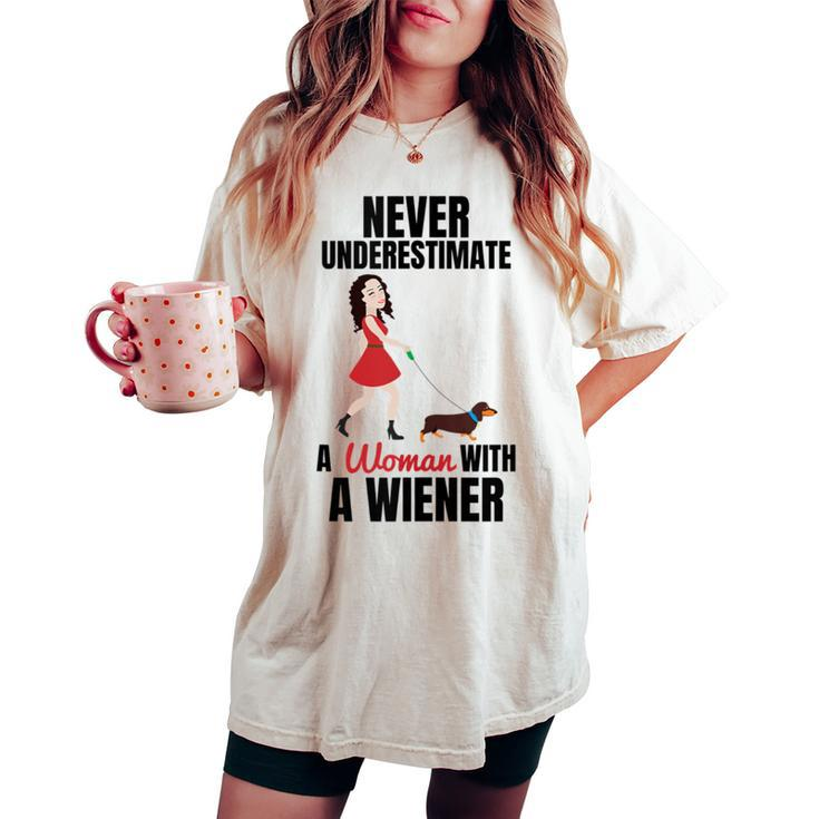 Never Underestimate A Woman With A Wiener Dachshund Women's Oversized Comfort T-shirt