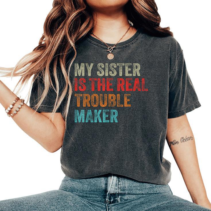 My Sister Is The Real Trouble Maker Girls Boys Groovy Women's Oversized Comfort T-Shirt