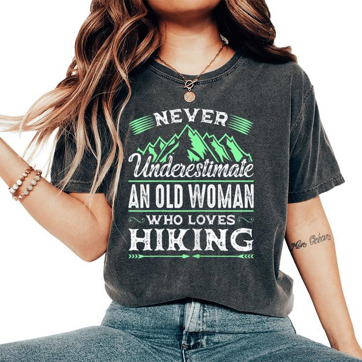 Never Underestimate An Old Woman Who Loves Hiking Women's Oversized Comfort T-Shirt