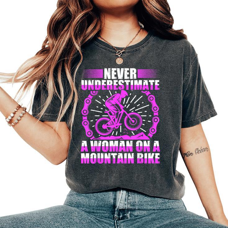 Never Underestimate A Woman On A Mountain Bike Women's Oversized Comfort T-Shirt