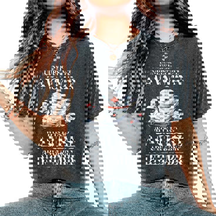 Never Underestimate A Woman Who Is Also A Nurse December Women's Oversized Comfort T-Shirt