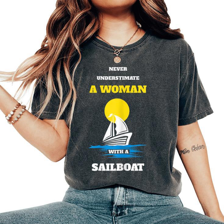 Never Underestimate A Woman With A Sailboat Boating Women's Oversized Comfort T-Shirt