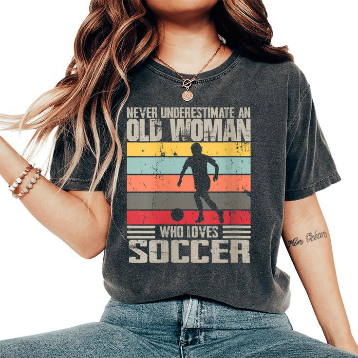 Vintage Never Underestimate An Old Woman Who Loves Soccer Women's Oversized Comfort T-Shirt