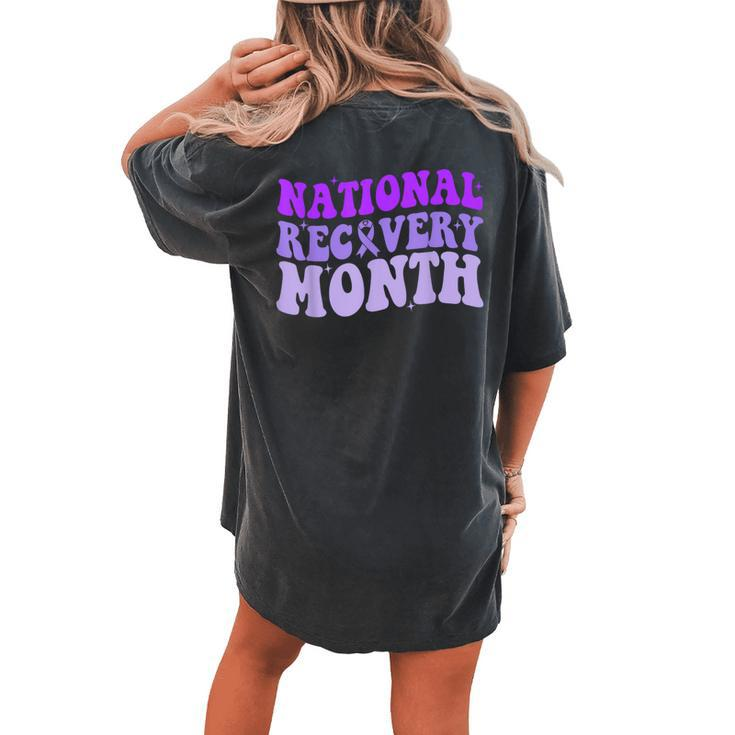 National Recovery Month Groovy Purple Ribbon Recovery Women's Oversized Comfort T-shirt Back Print