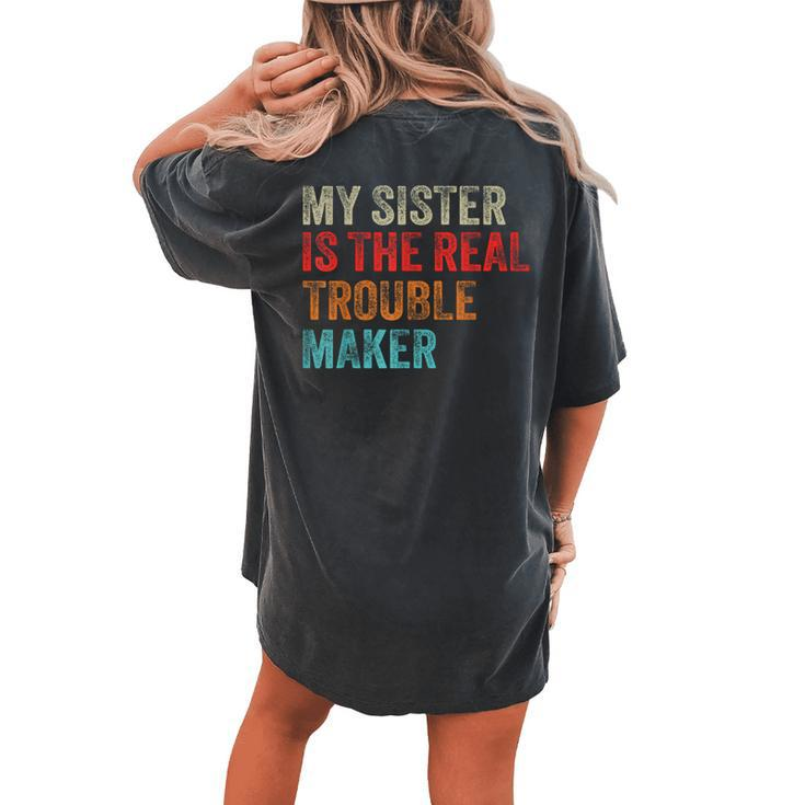 My Sister Is The Real Trouble Maker Girls Boys Groovy Women's Oversized Comfort T-shirt Back Print