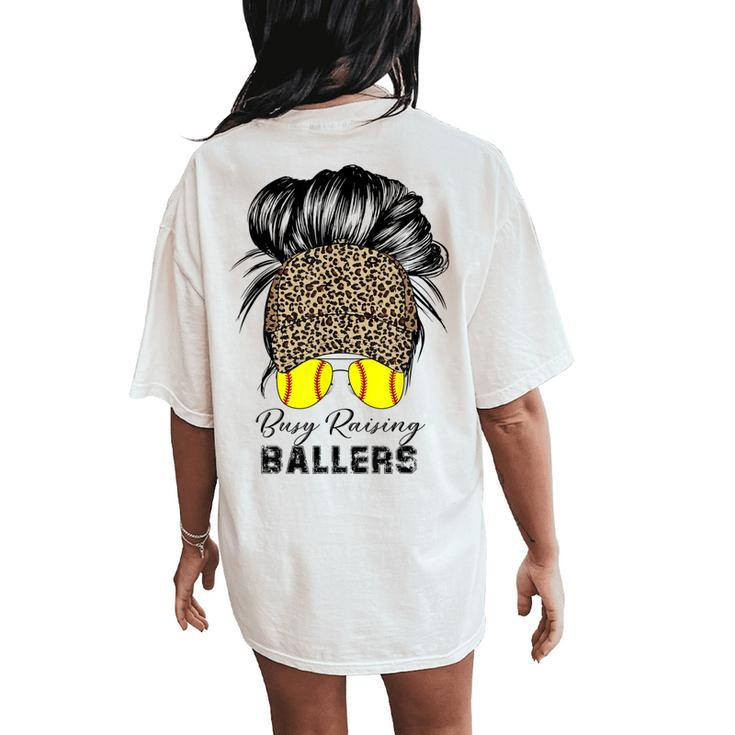 Busy Raising Ballers Softball Mom Bun Leopard Baseball Cap Women's Oversized Comfort T-Shirt Back Print