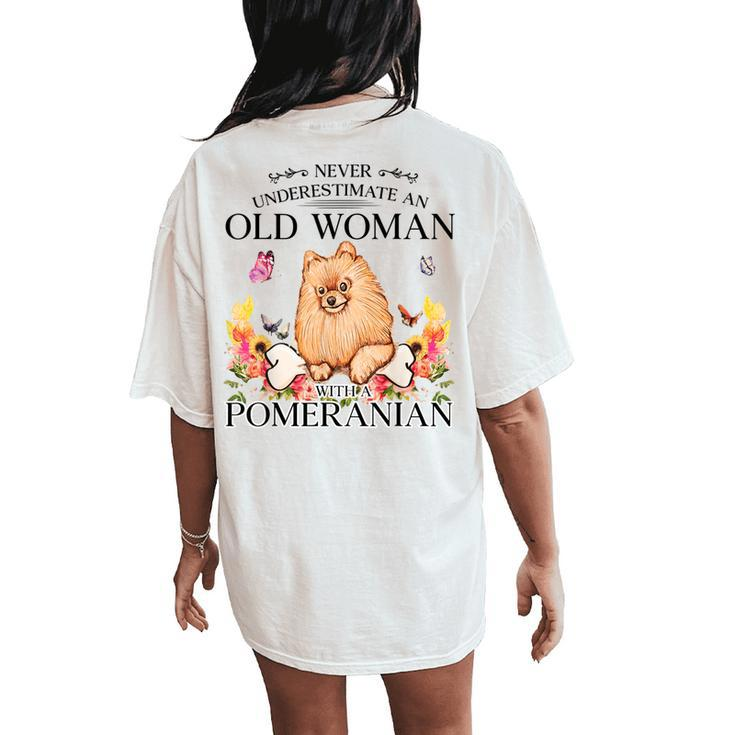 Never Underestimate An Old Woman With A Pomeranian Women's Oversized Comfort T-Shirt Back Print