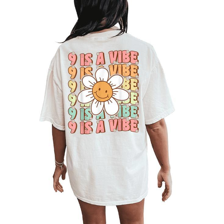 Nine Is A Vibe Cute Groovy 9Th Birthday Party Daisy Flower Women's Oversized Comfort T-Shirt Back Print