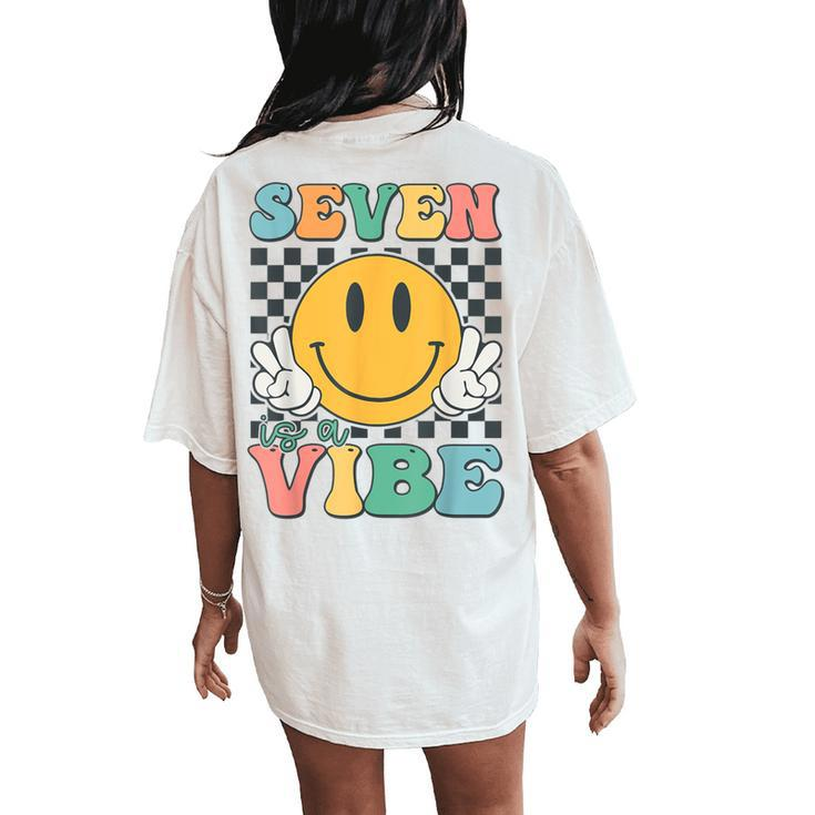 Seven Is A Vibe 7Th Birthday Smile Face Hippie Boy Girl Kid Women's Oversized Comfort T-Shirt Back Print