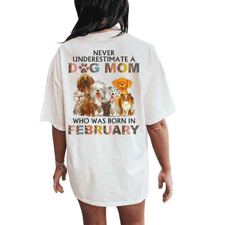 Never Underestimate A Dog Mom Who Was Born In February Women's Oversized Comfort T-Shirt Back Print