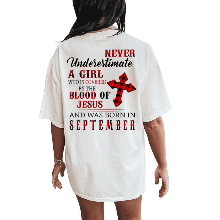 Never Underestimate A Girl Was Borns On September Jesuses Women's Oversized Comfort T-Shirt Back Print
