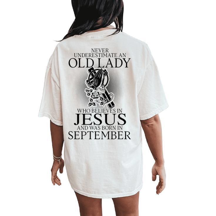 Never Underestimate An Old Lady Believes In Jesus September Women's Oversized Comfort T-Shirt Back Print