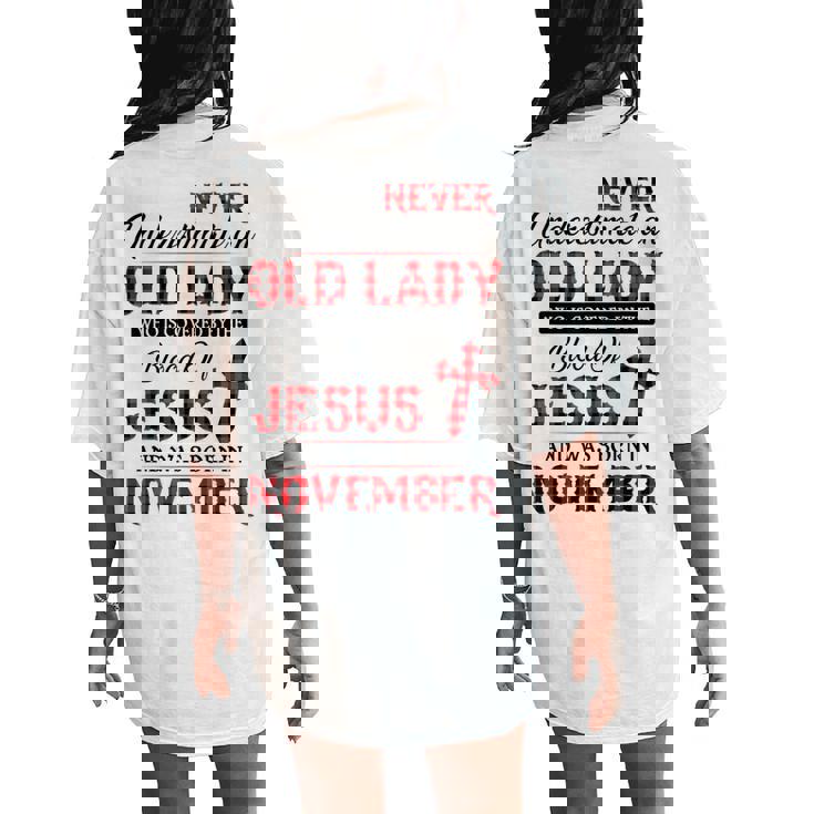 Never Underestimate An Old Lady Who Is Covered By-November Women's Oversized Comfort T-Shirt Back Print