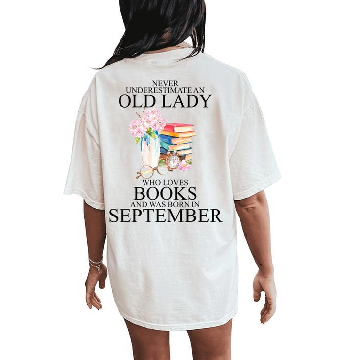Never Underestimate An Old Lady Who Loves Books September Women's Oversized Comfort T-Shirt Back Print