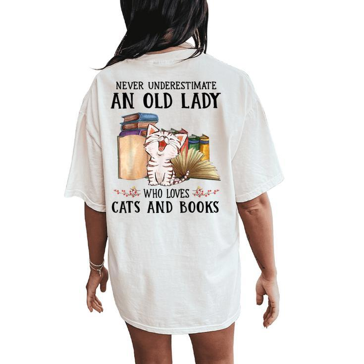 Never Underestimate An Old Lady Who Loves Cats And Books Women's Oversized Comfort T-Shirt Back Print